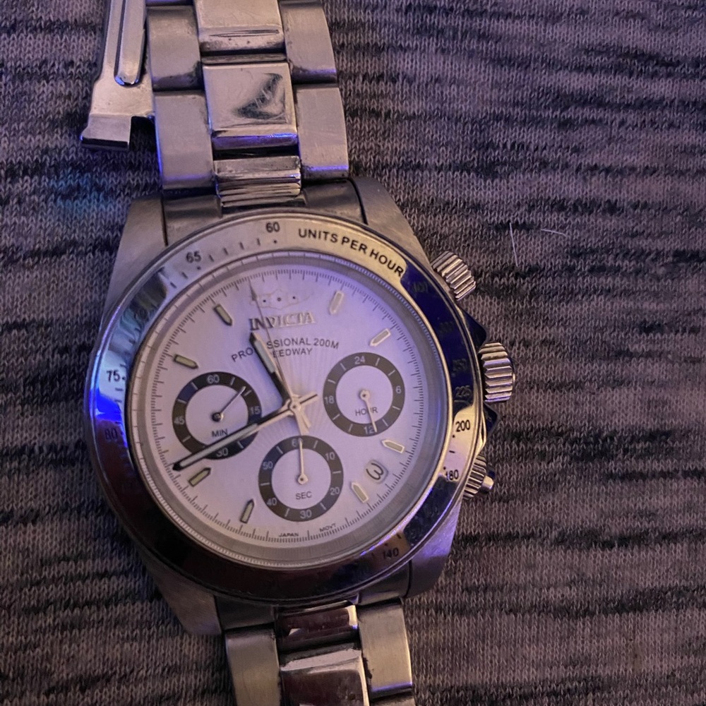 invicta watch needs battery n band needs to be put back in place